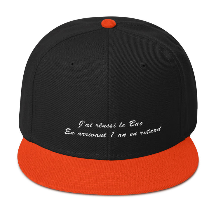 Casquette snapback "J'ai réussi le Bac en arrivant 1 an en retard"